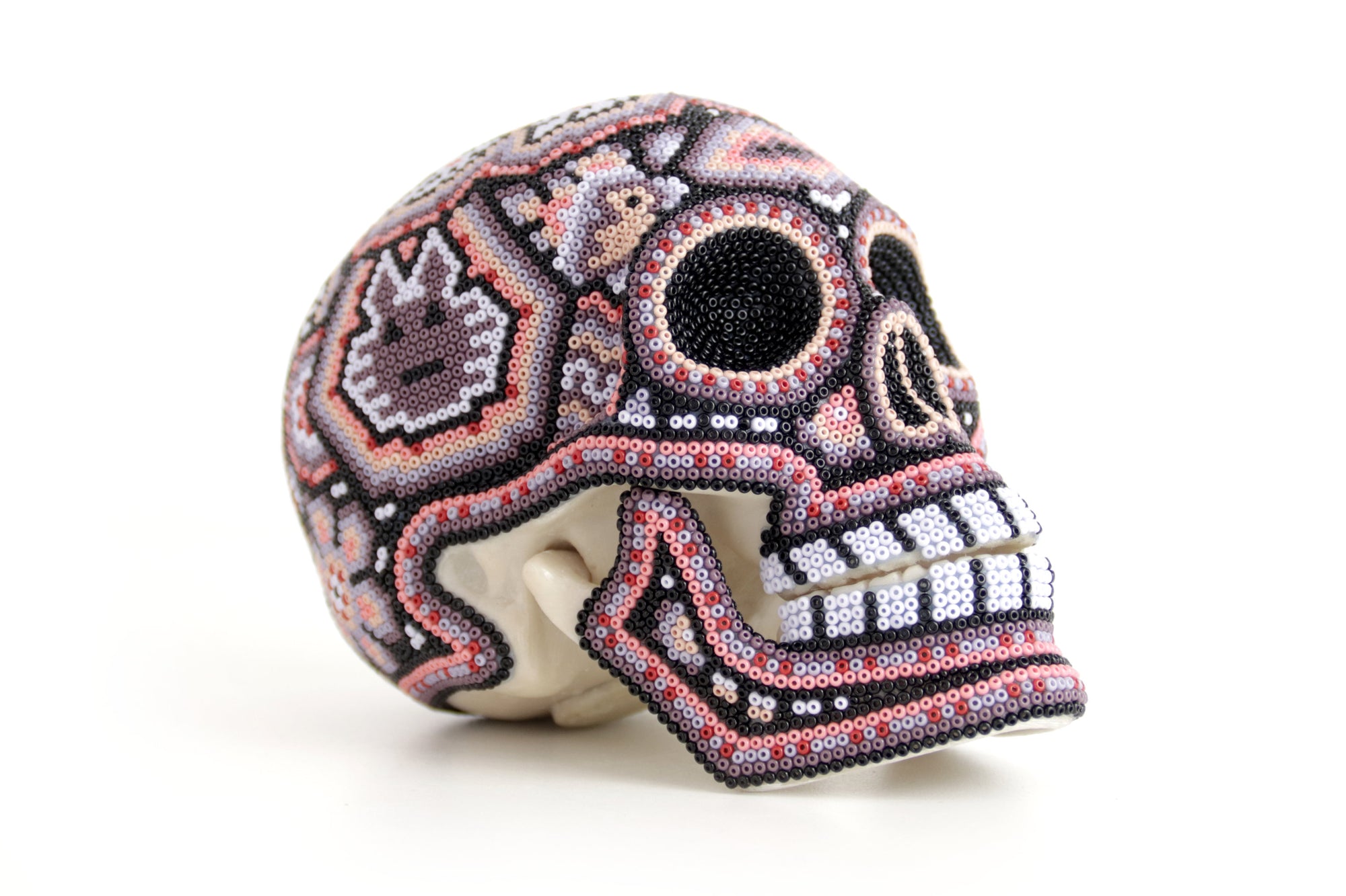 Calavera Huichol Mediana - Eyekame - Flor espectral del amanecer rosado