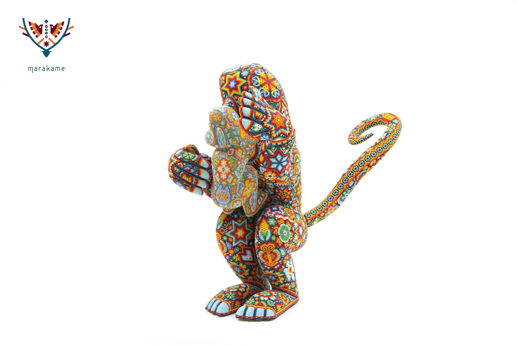 Escultura de copal Chango con bebé - Yurienaka - Arte Huichol - Marakame