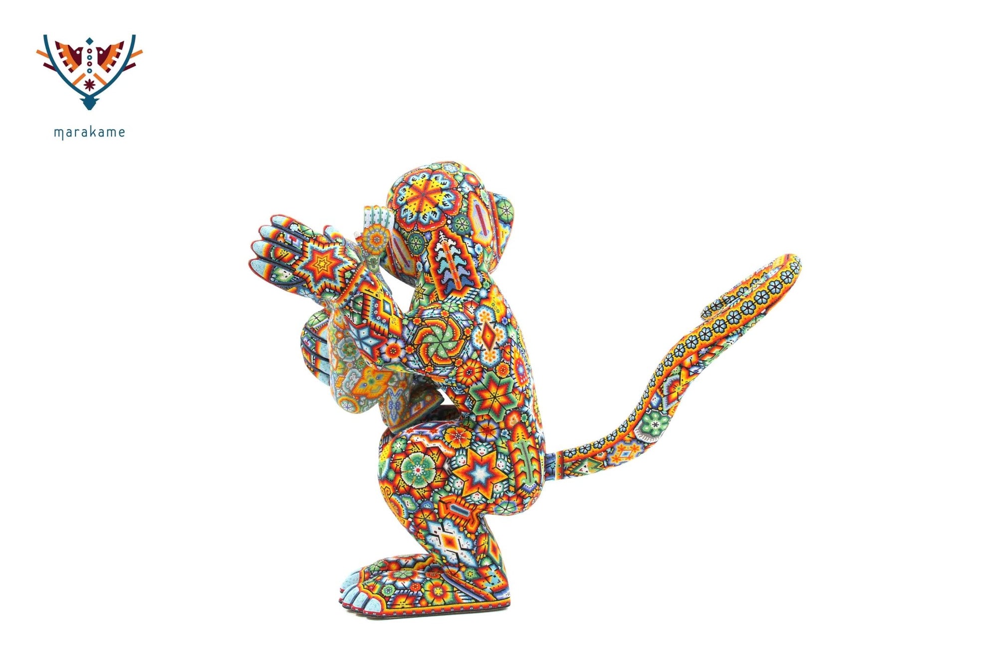 Escultura de copal Chango con bebé - Yurienaka - Arte Huichol - Marakame